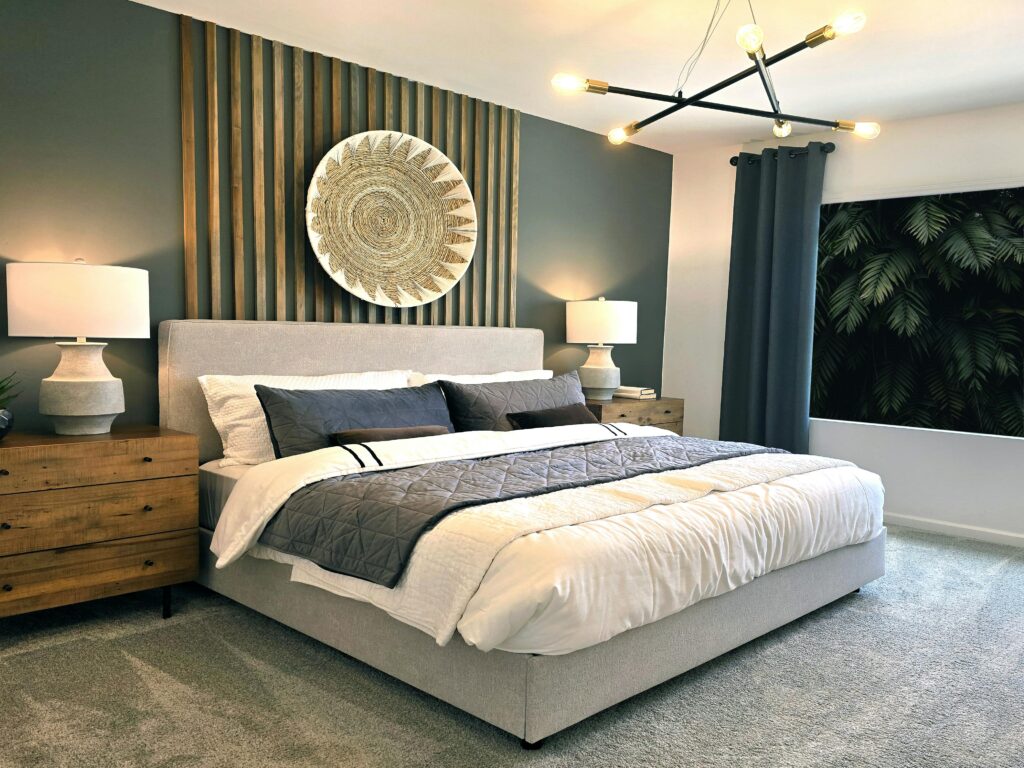 Stylish bedroom design featuring a cozy bed and unique wall art for a modern touch.