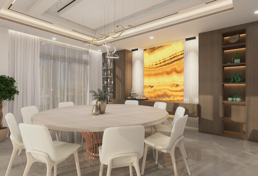 Stylish modern dining room featuring a round table, elegant lighting, and warm decor.