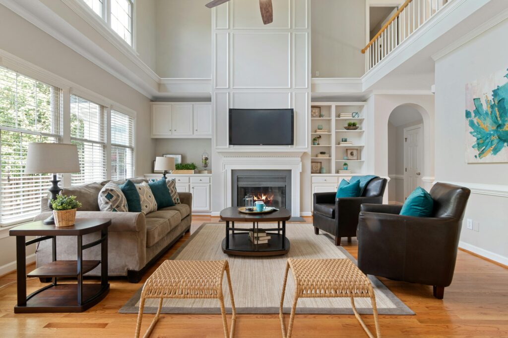 Beautifully designed living room featuring a cozy fireplace and elegant furnishings.